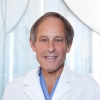 Portrait image of Anthony Pucillo in his white lab coat