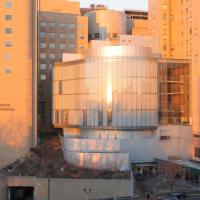 The exterior of Milstein Hospital at dusk.